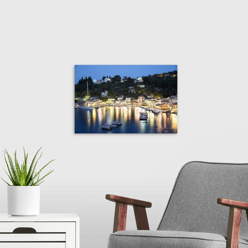 A modern room featuring View over harbour at night, Loggos, Paxos, Ionian Islands, Greek Islands, Greece, Europe
