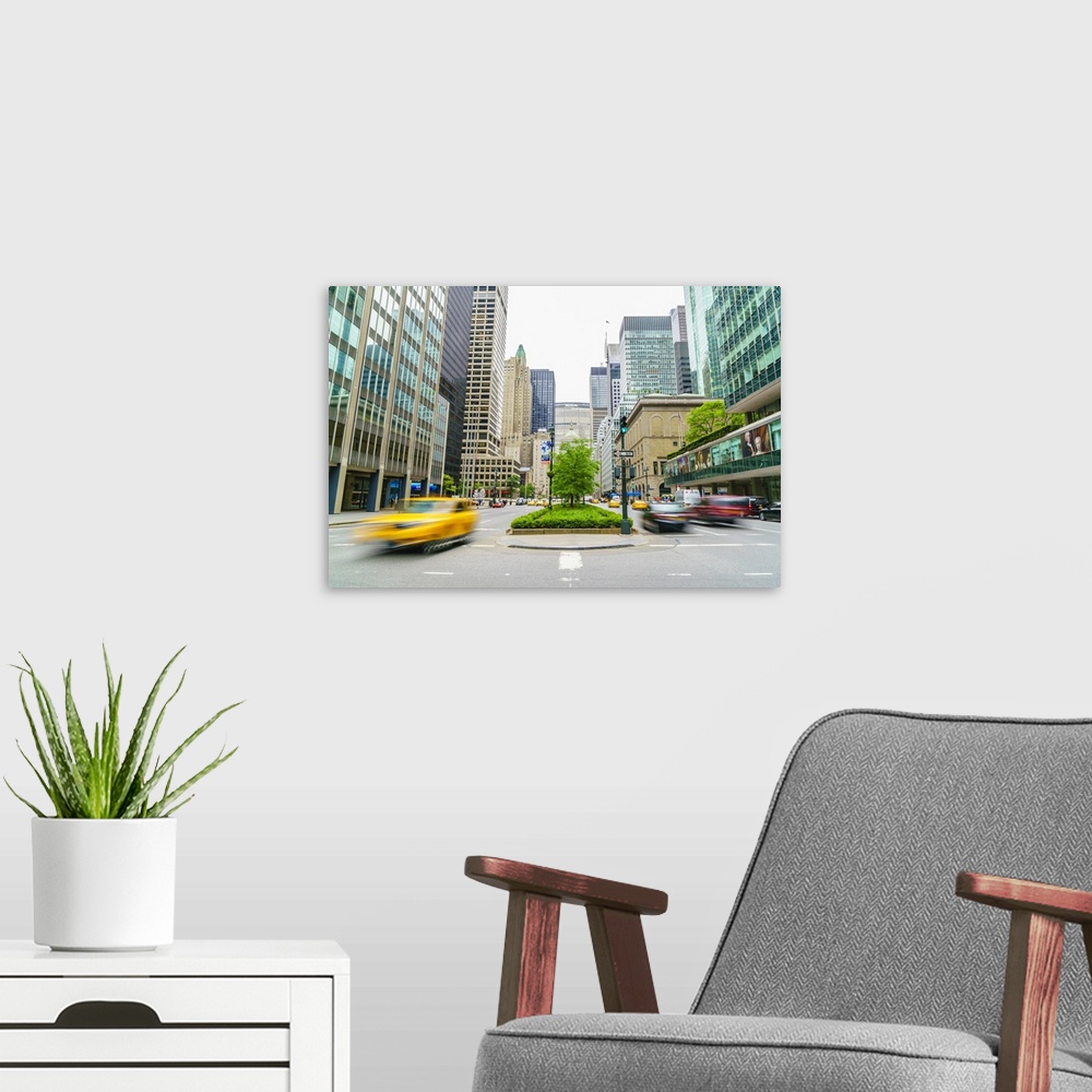 A modern room featuring Yellow cab and cars on Park Avenue, Manhattan, New York City, United States of America, North Ame...