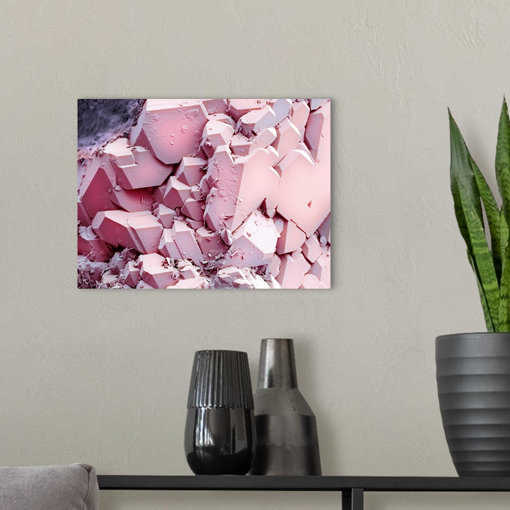 A modern room featuring Quartz crystals, coloured scanning electron micrograph (SEM). This silicate mineral is a form of ...