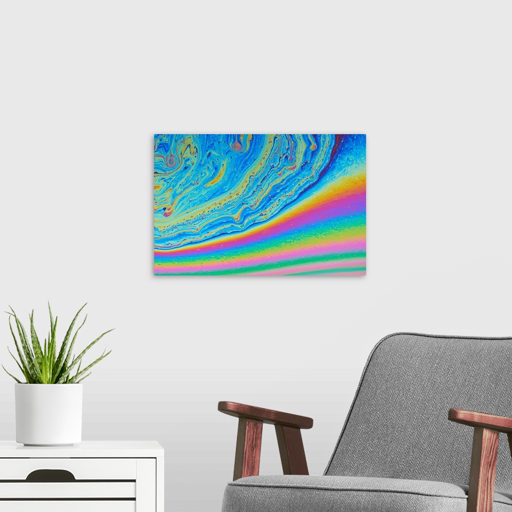A modern room featuring Colours in a soap film. The colours are produced by the interference of light waves reflected fro...