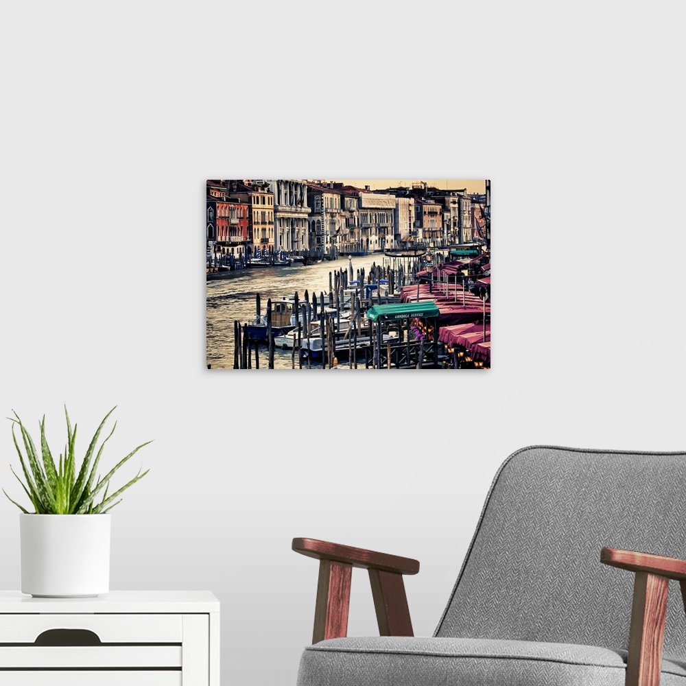A modern room featuring Photograph of the famous gondola boats on the river in Venice, Italy.