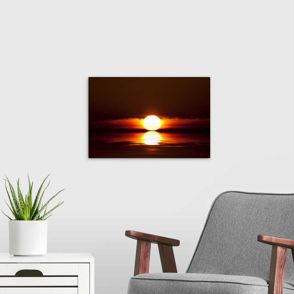 A modern room featuring Sunset touching the water