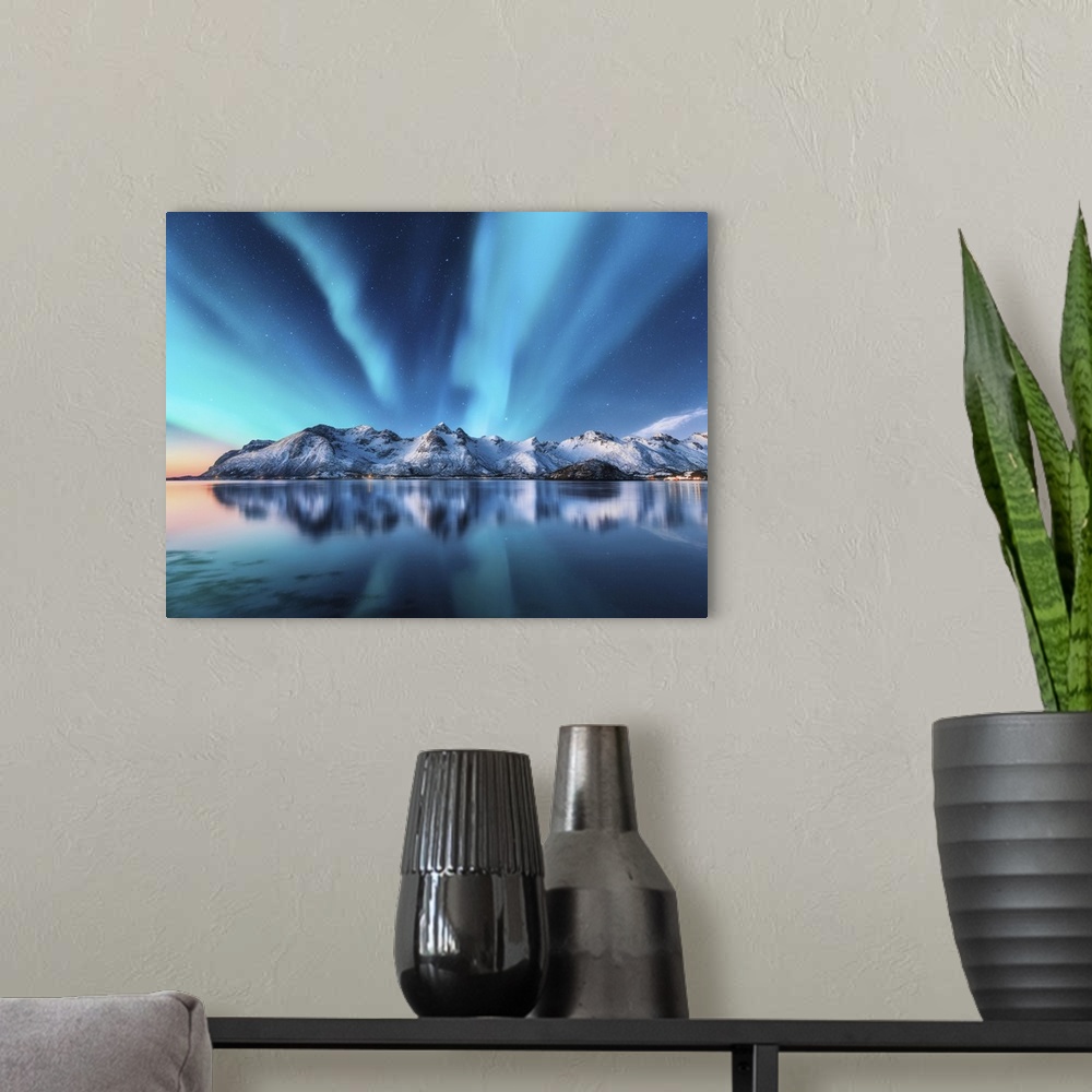 A modern room featuring Northern Lights And Snow Covered Mountains In Lofoten Islands, Norway