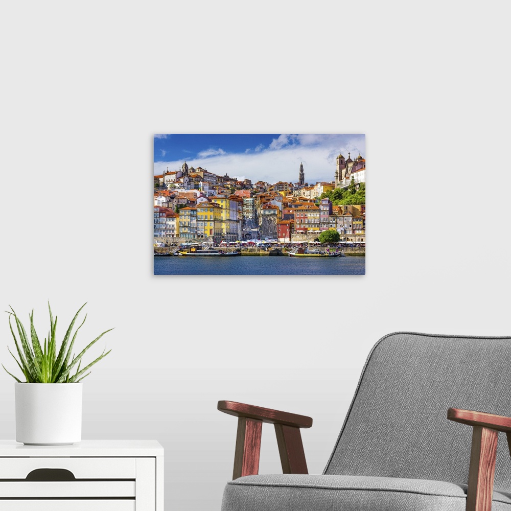 A modern room featuring Porto, Portugal old town skyline from across the Douro River.