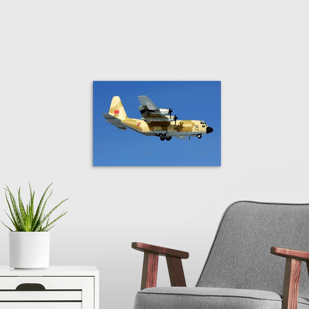 A modern room featuring A C-130H Hercules military transport airplane of the Royal Moroccan Air Force.