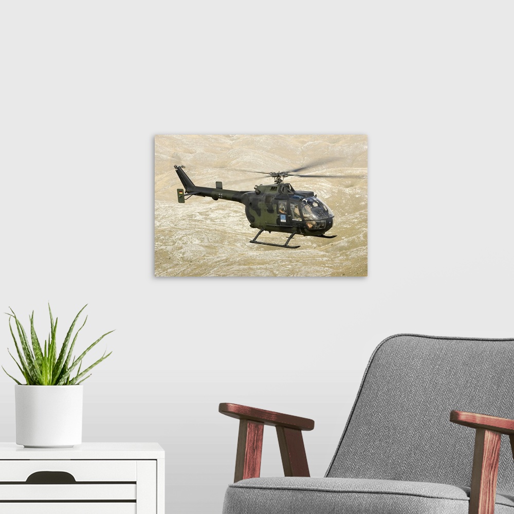 A modern room featuring A German Army Bo-105P helicopter near Mount Igman in Bosnia-Herzegovina.