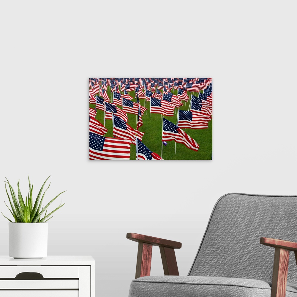 A modern room featuring An abundance of American Flags.