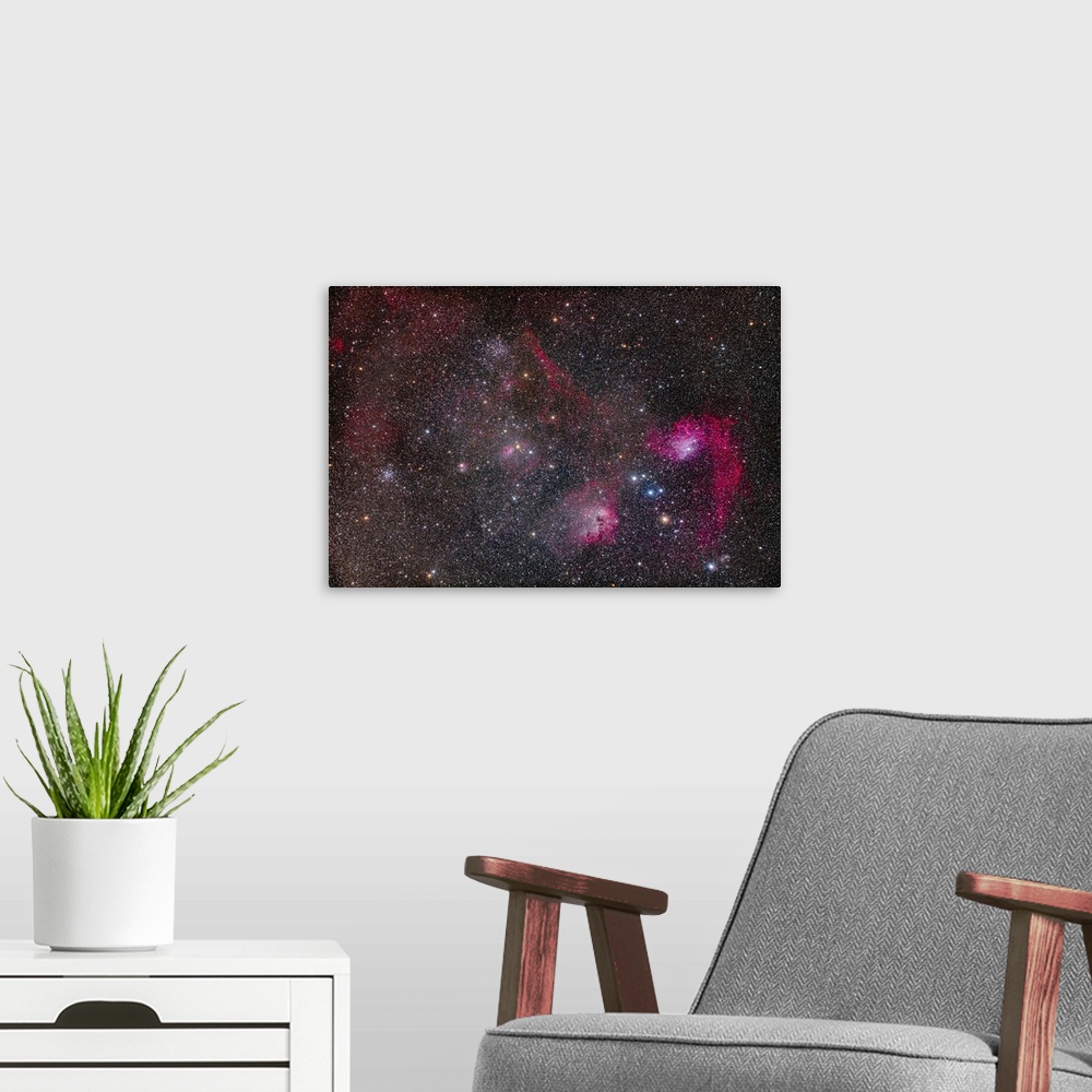 A modern room featuring A collection of bright star clusters and colorful nebulas in central Auriga. --Messier 36, aka th...