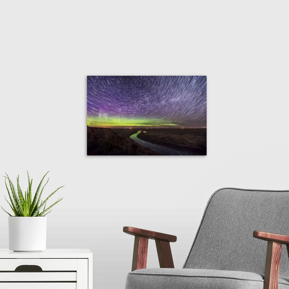 A modern room featuring Circumpolar star trails and aurora over the Red Deer River, Alberta, Canada.