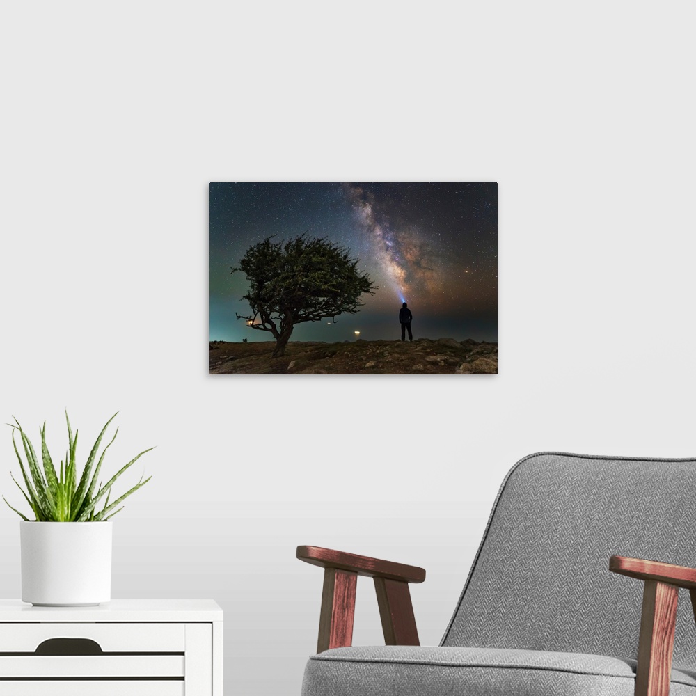 A modern room featuring Explorer looking at the Milky Way from the coast of the Black Sea.