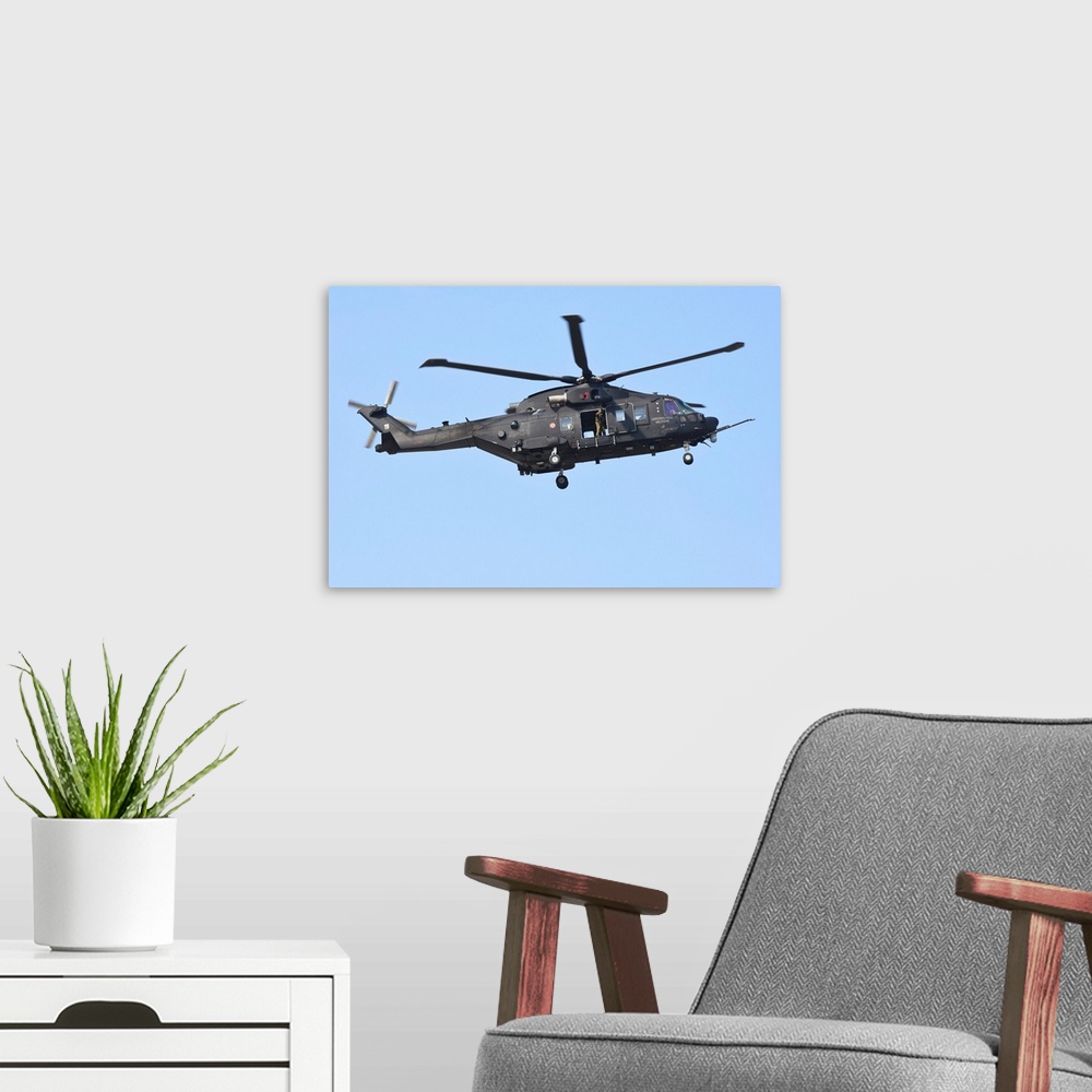 A modern room featuring HH-101A Caesar Combat-SAR helicopter of the Italian Air Force landing.