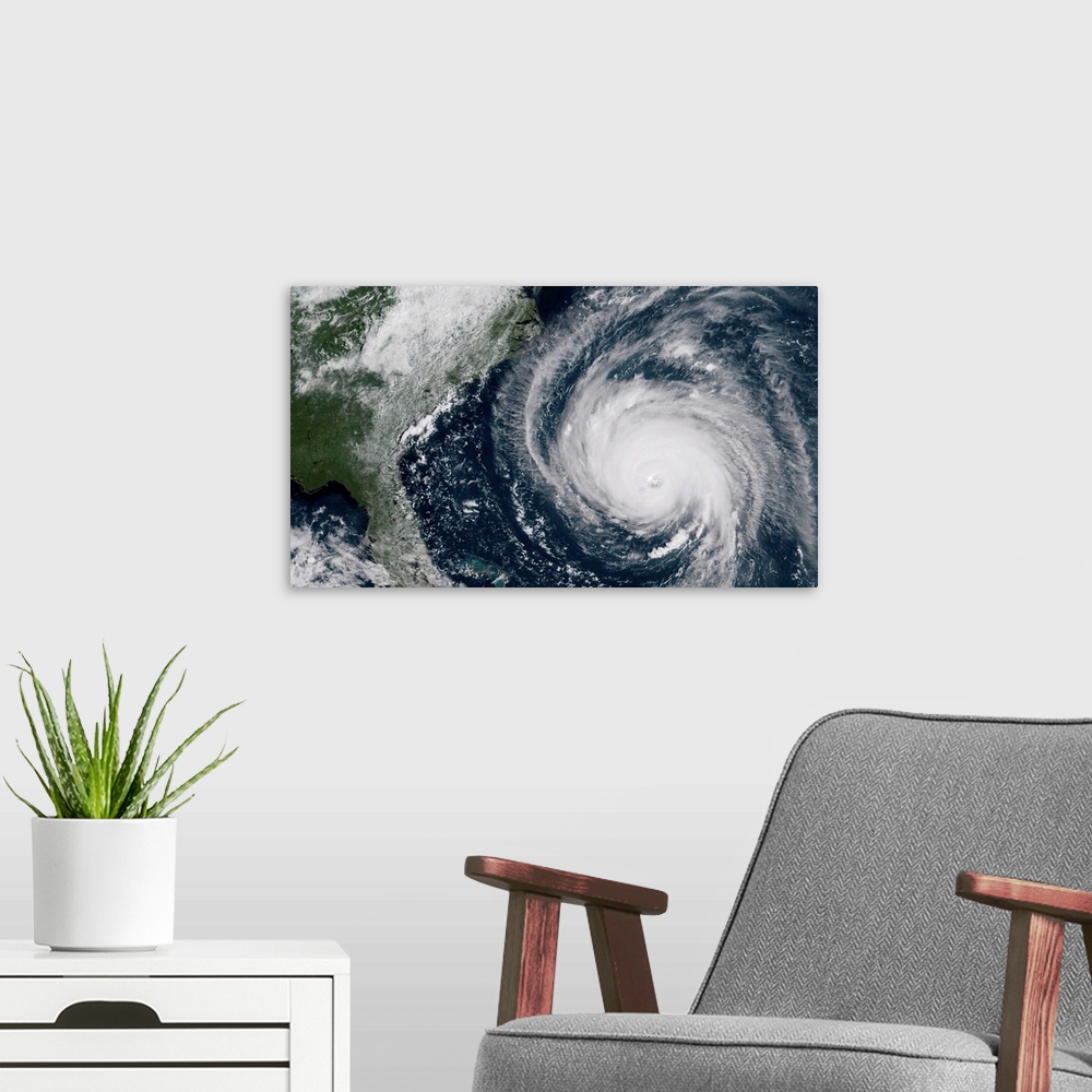 A modern room featuring Hurricane Florence moving closer to the coast of the Southeastern United States.