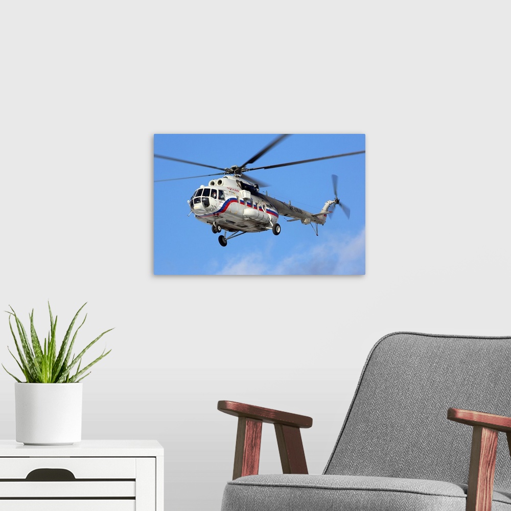 A modern room featuring Mil Mi-8AMT transport helicopter of special flight unit landing
