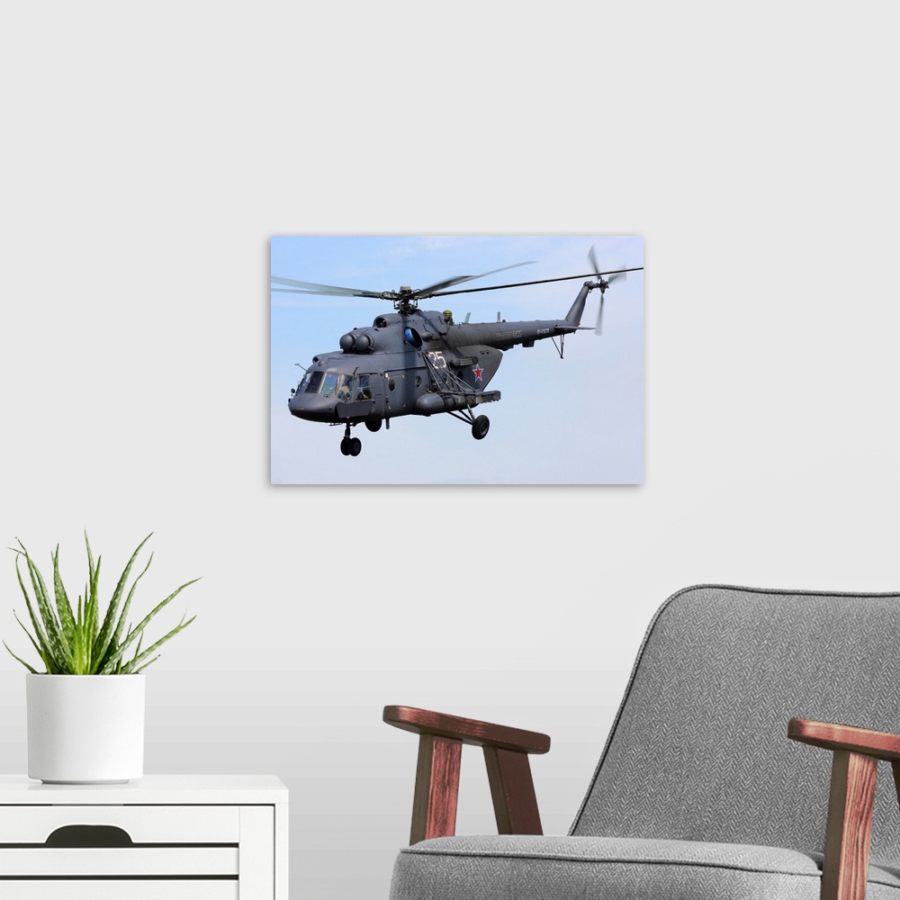 A modern room featuring Mil Mi-8AMTSH transport helicopter of the Russian Air Force.