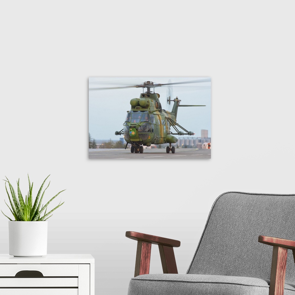 A modern room featuring Romanian Air Force IAR-330 helicopter during Exercise Isik 2016 in Konya, Turkey.