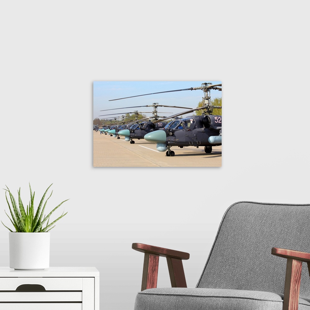 A modern room featuring Row of Ka-52 Alligator attack helicopters of the Russian Air Force.