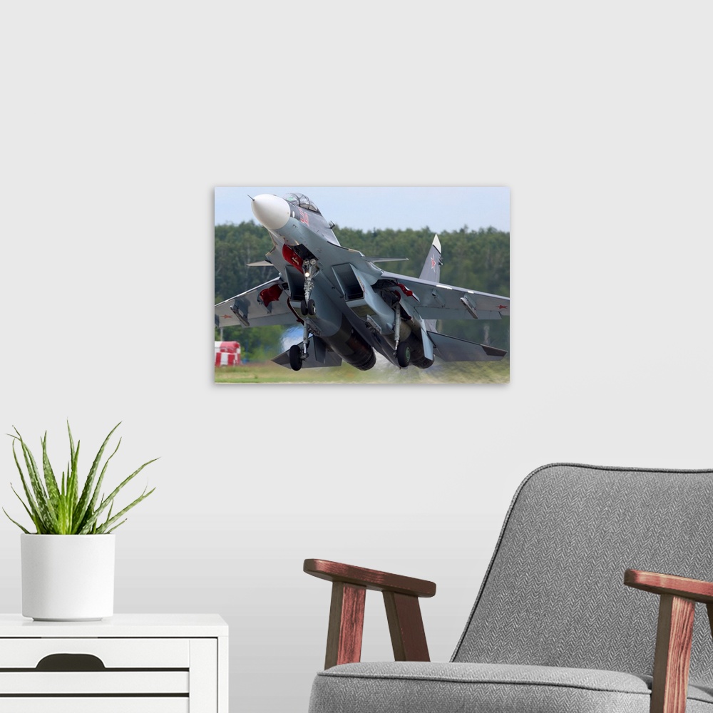A modern room featuring Su-30SM jet fighter of Russian Air Force taking off, Kubinka, Russia.