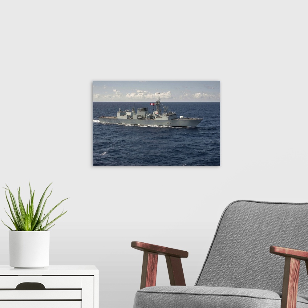 A modern room featuring The Canadian frigate HMCS Regina.