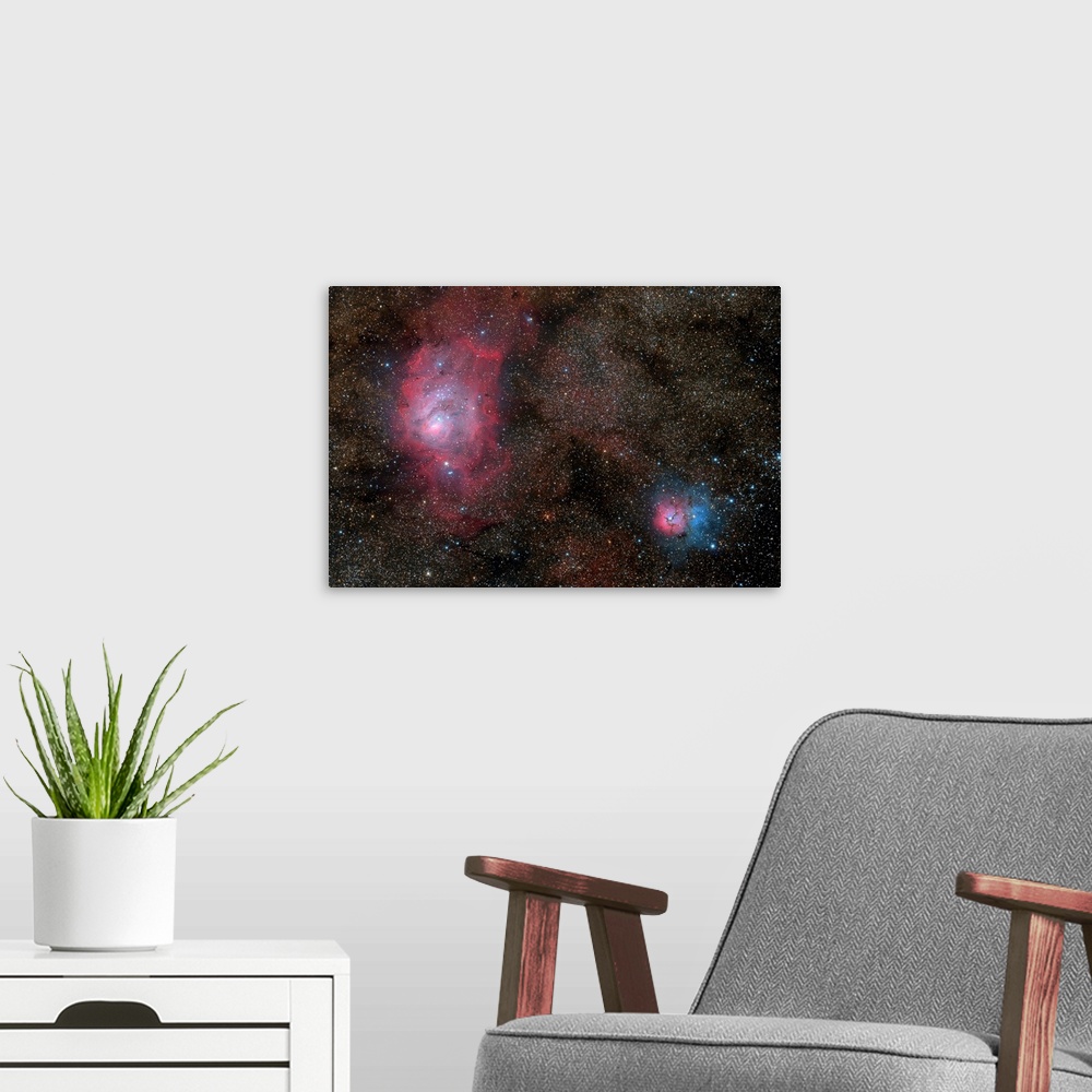 A modern room featuring The Lagoon Nebula and Trifid Nebula.