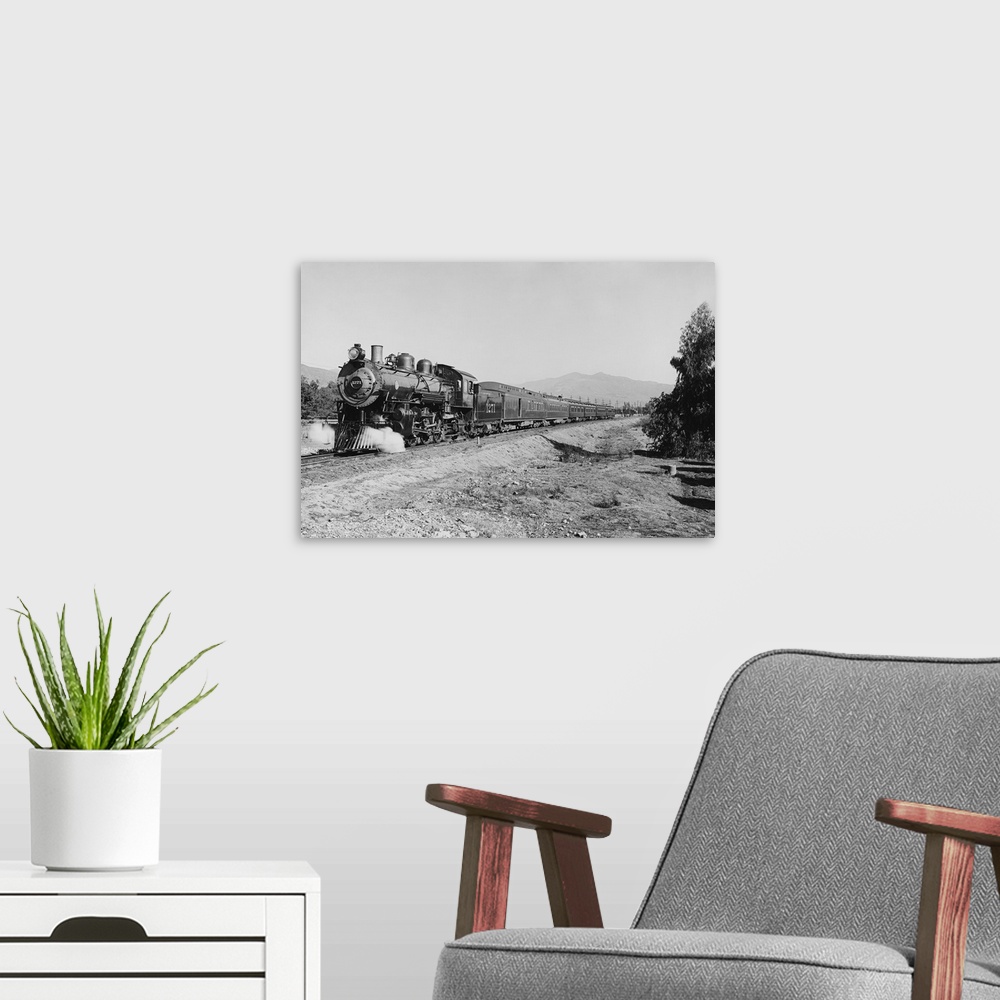 A modern room featuring Vintage photo of a passenger train speeding down the tracks.