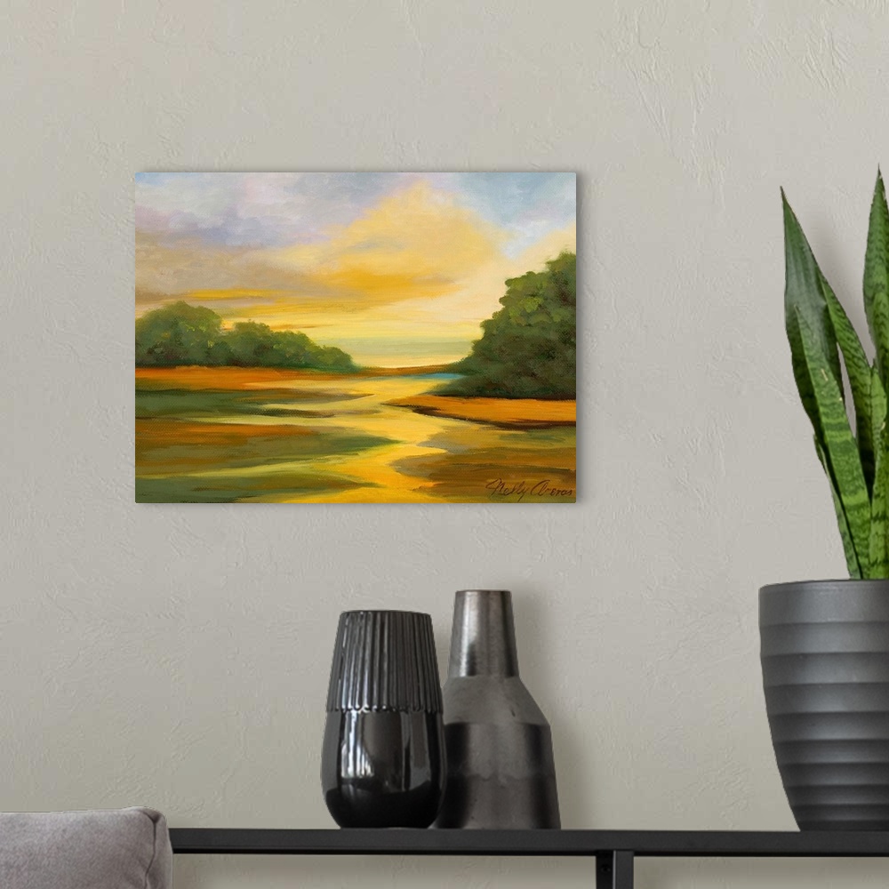 A modern room featuring Contemporary landscape artwork of a field at sunset.