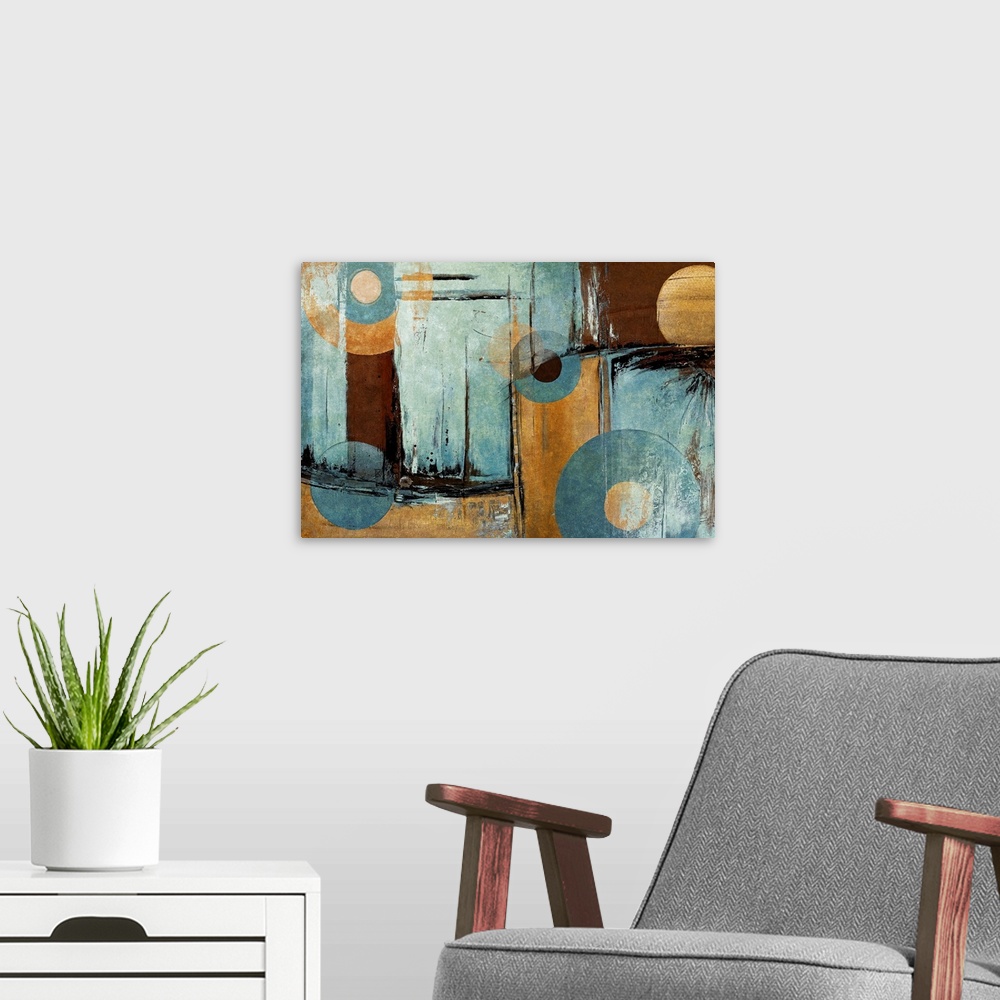 A modern room featuring Giant abstract art composed of different distressed rectangular patches of earth toned colors.  O...
