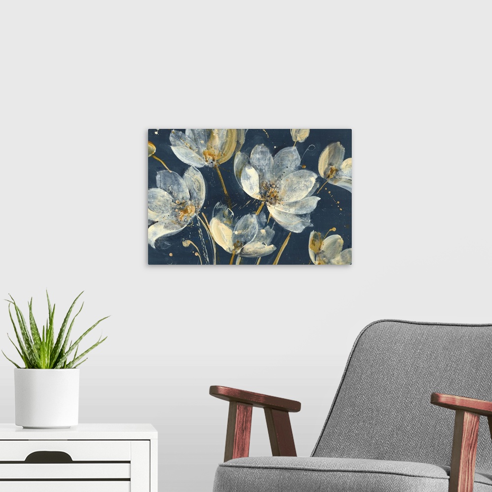 A modern room featuring Large abstract painting of white and gold flowers on a dark blue background.