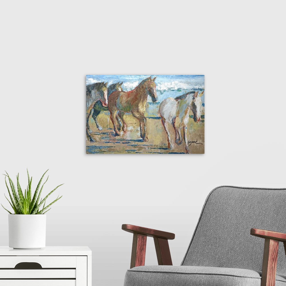 A modern room featuring Contemporary art print of a herd of horses trotting along the beach.