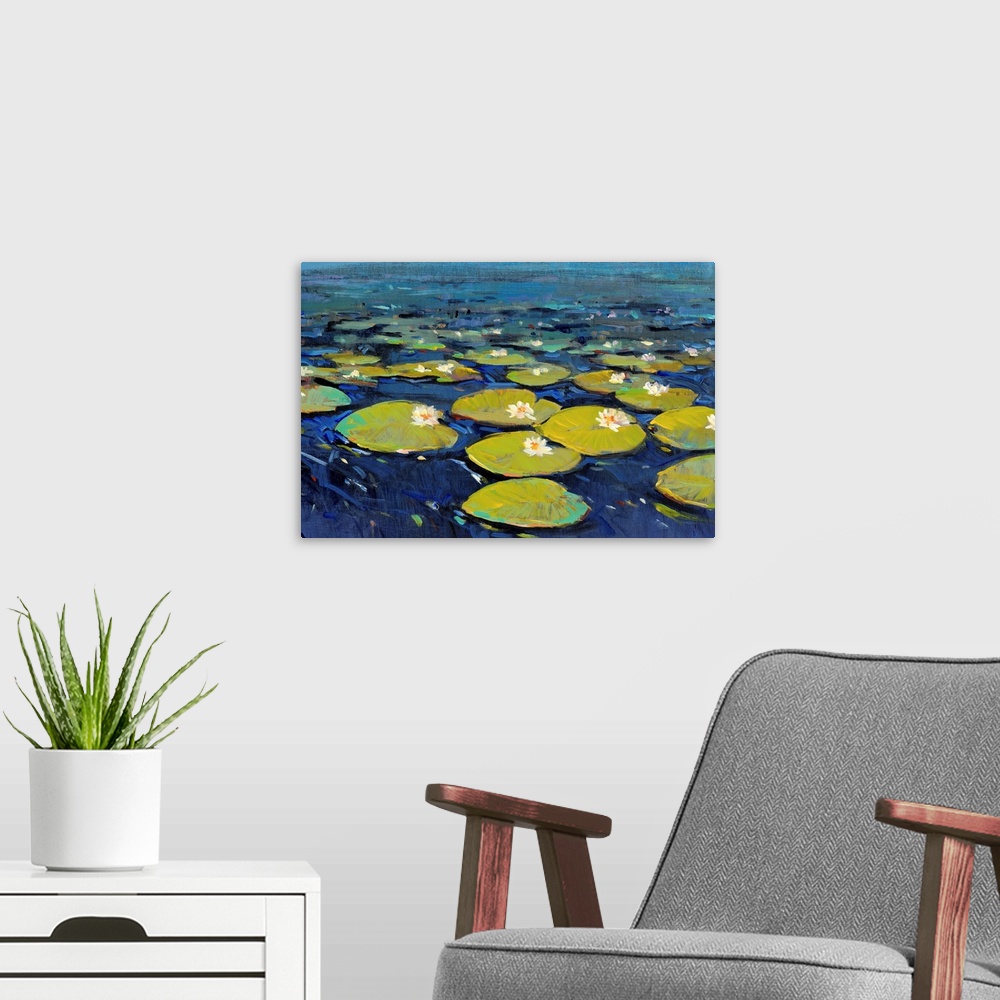 A modern room featuring Contemporary painting of bright green lily pads in a deep blue pond.