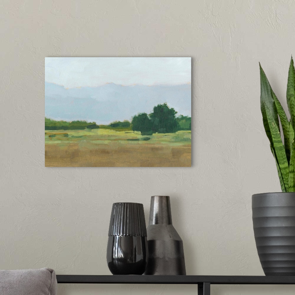A modern room featuring Contemporary landscape painting in green and brown with a mountain range in the distance.