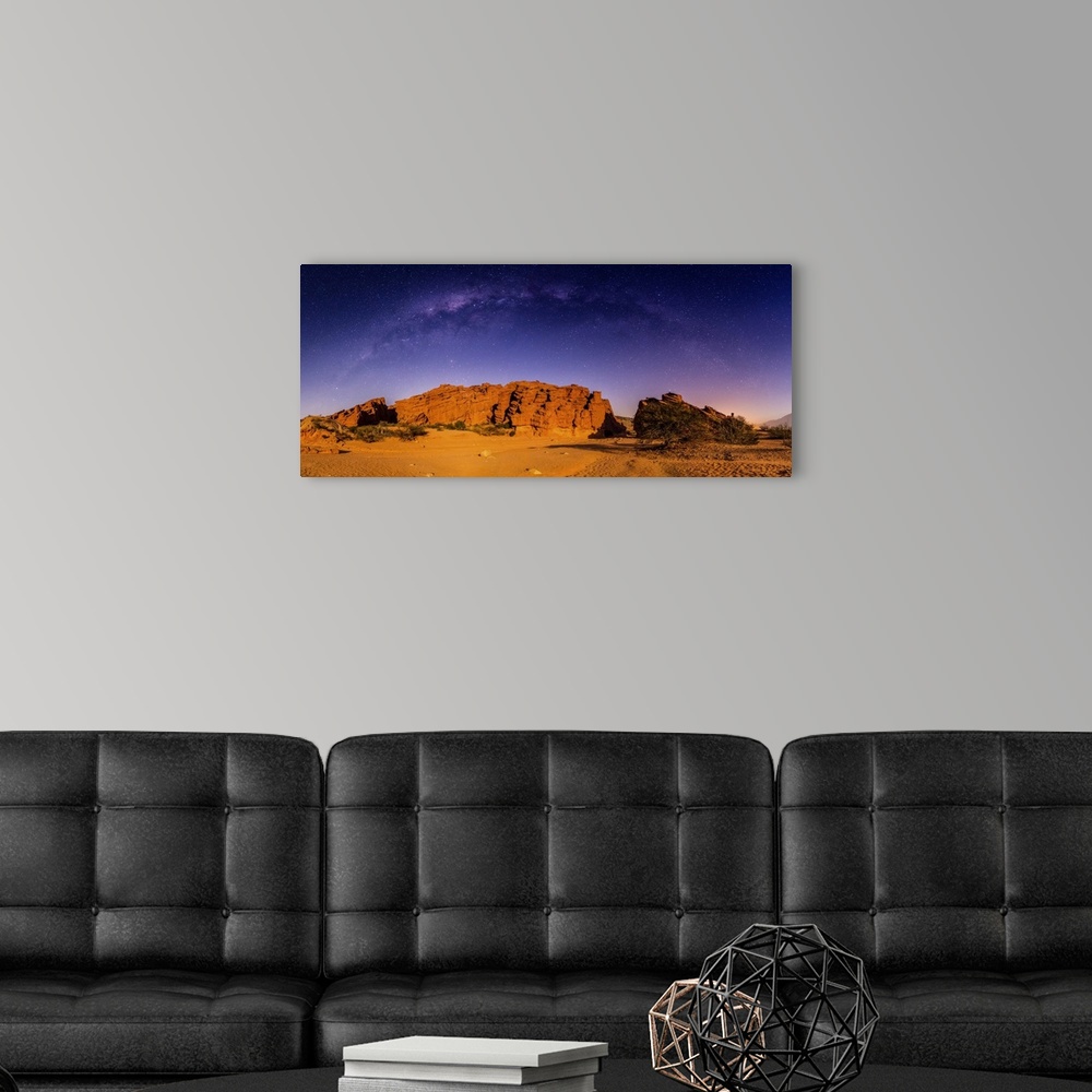 A modern room featuring Milky way over a rock formation; Tres Cruces, Salta, Argentina.
