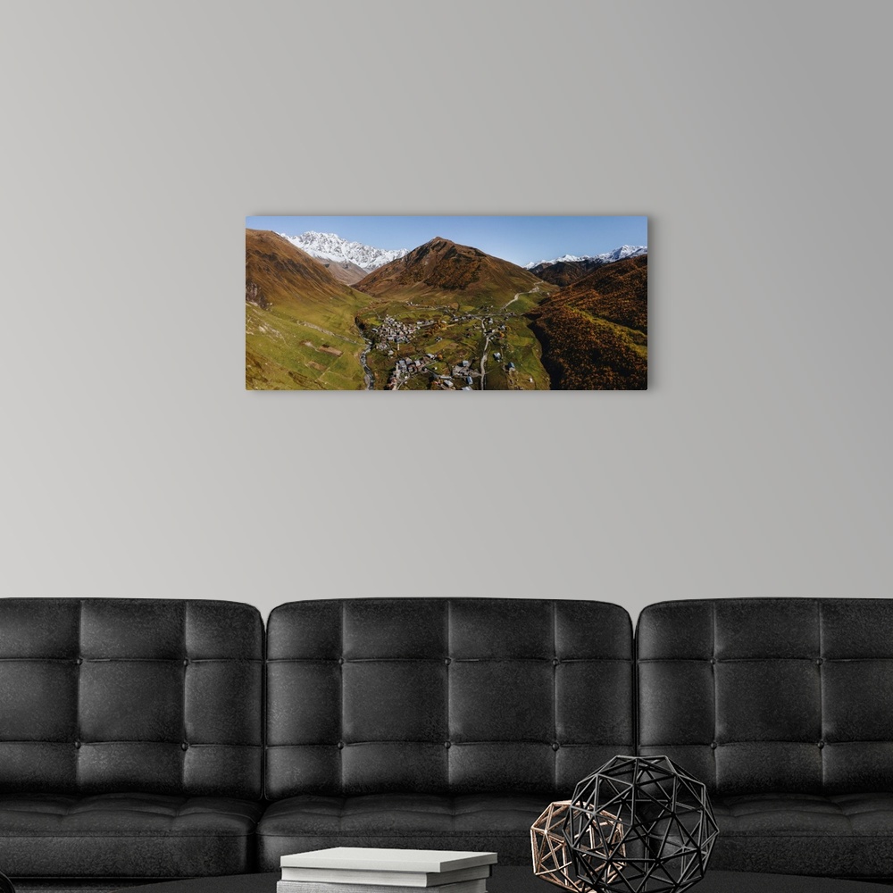 A modern room featuring Landscape panoramic view of Ushguli, with Mount Shkhara in the background, Mestia, Samegrelo-Uppe...