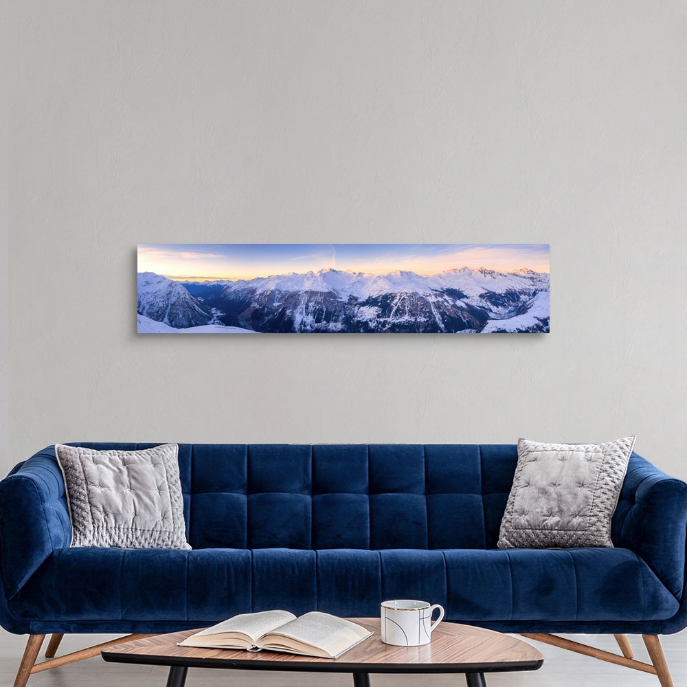 A modern room featuring Snowy peaks of Valle Spluga at sunset, aerial view, Valchiavenna, Valtellina, Lombardy, Italy, Eu...