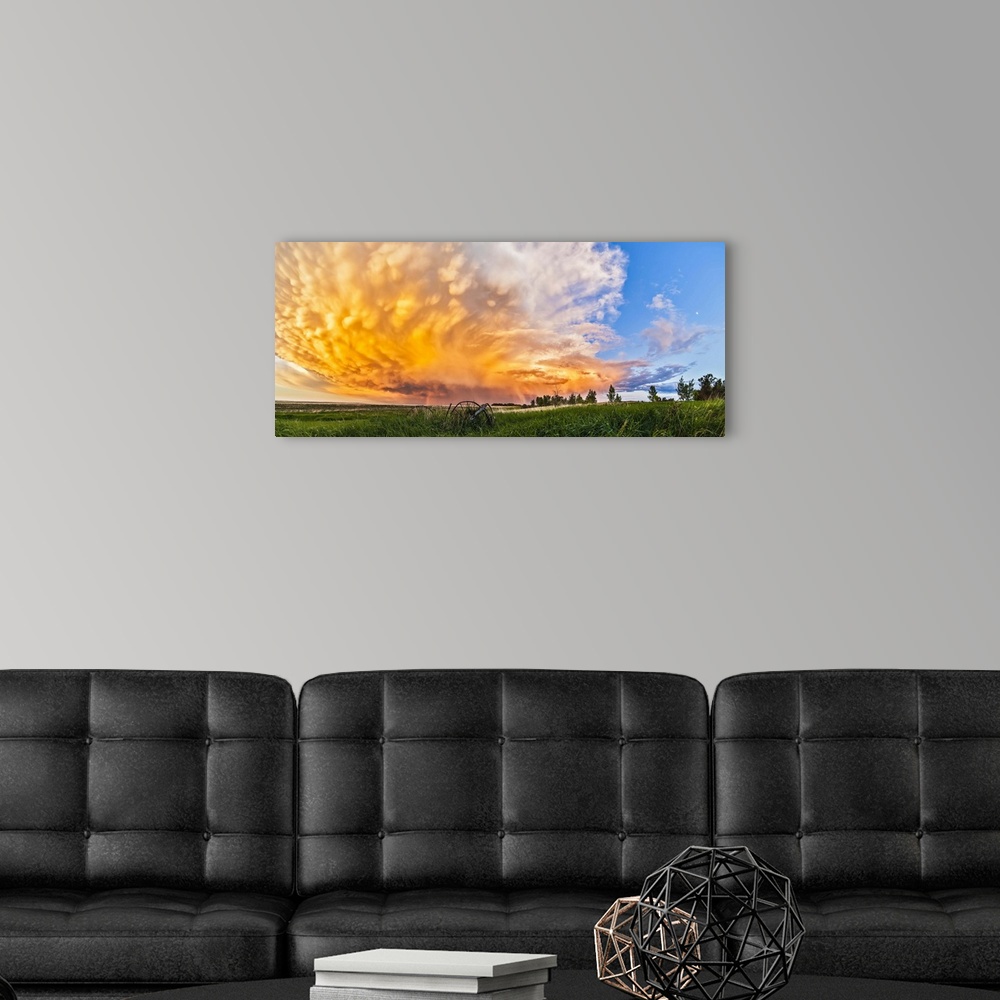 A modern room featuring June 17, 2013 - Panoramic view of a retreating thunderstorm at sunset, Alberta, Canada. The storm...