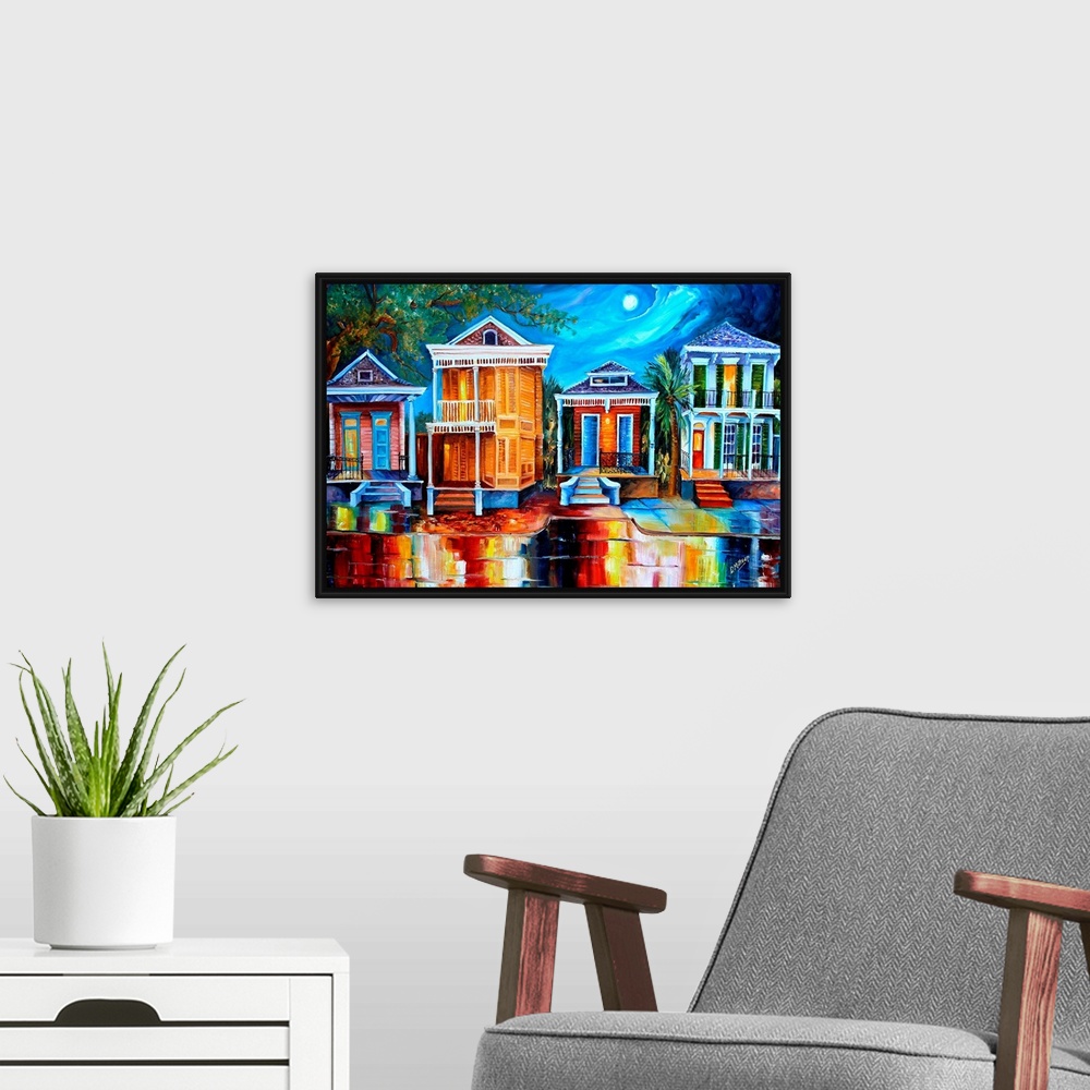 A modern room featuring This contemporary nighttime scene features a row of historic shotgun houses in New Orleans. The b...