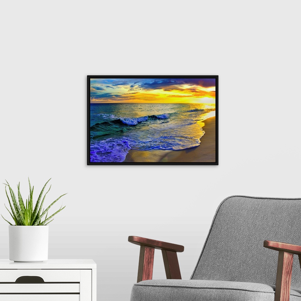 A modern room featuring Image of waves rolling over Navarre beach before a dark yellow sunset seascape. Landscape taken o...