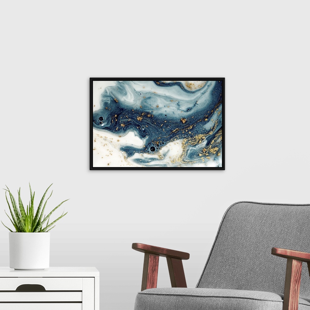 A modern room featuring Fluid/liquid art with golden powder and sequins. Marble effect painting. Turkish paper.