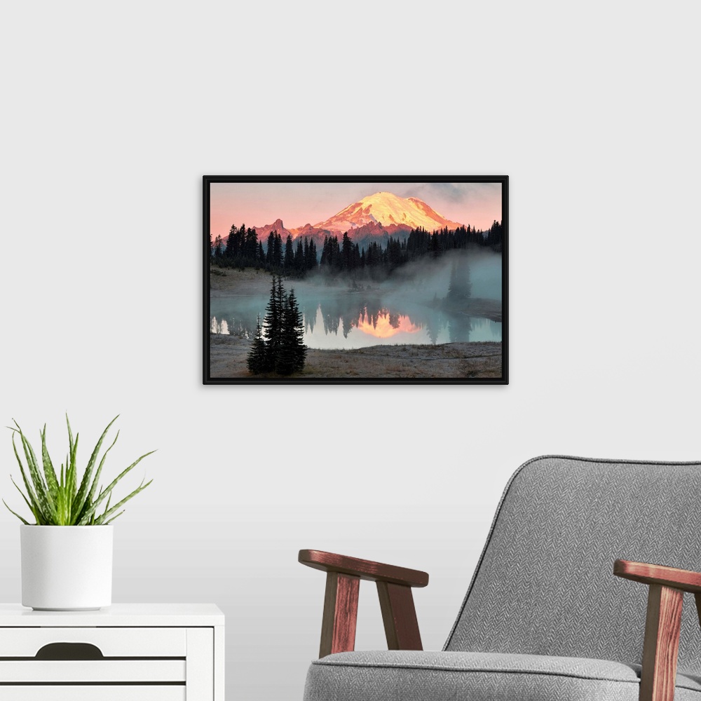 A modern room featuring Fine art photo of sunlight hitting the snow peak of Mount Rainier, Washington.