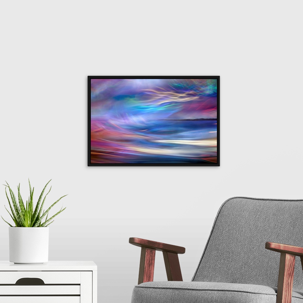 A modern room featuring Abstract photograph using time lapsed photography techniques creating indistinct light trails ble...