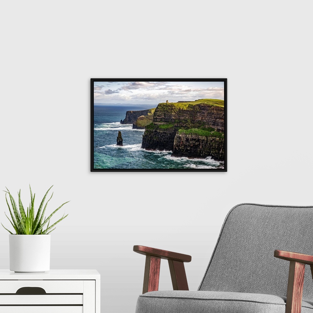 A modern room featuring Photograph of the Cliffs of Moher with O'Brien's Tower seen in the distance, marking the highest ...