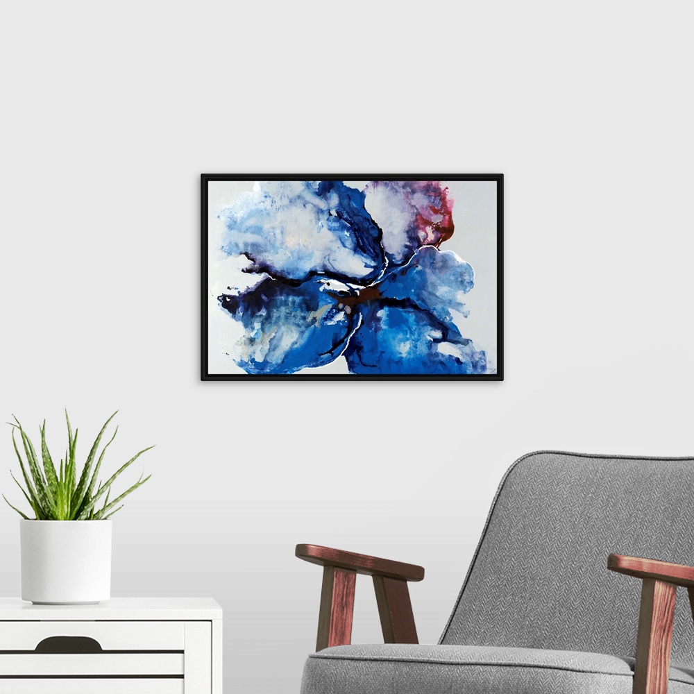 A modern room featuring Large abstract art incorporates jagged patches of mostly monochromatic cool tones in front of a b...