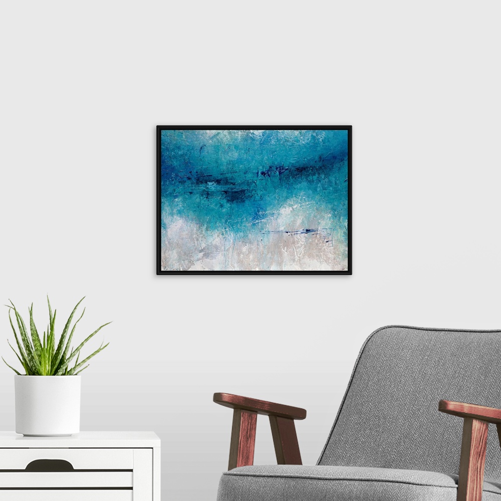 A modern room featuring Abstract artwork consisting of a bright blue  mass over a cool, neutral background.