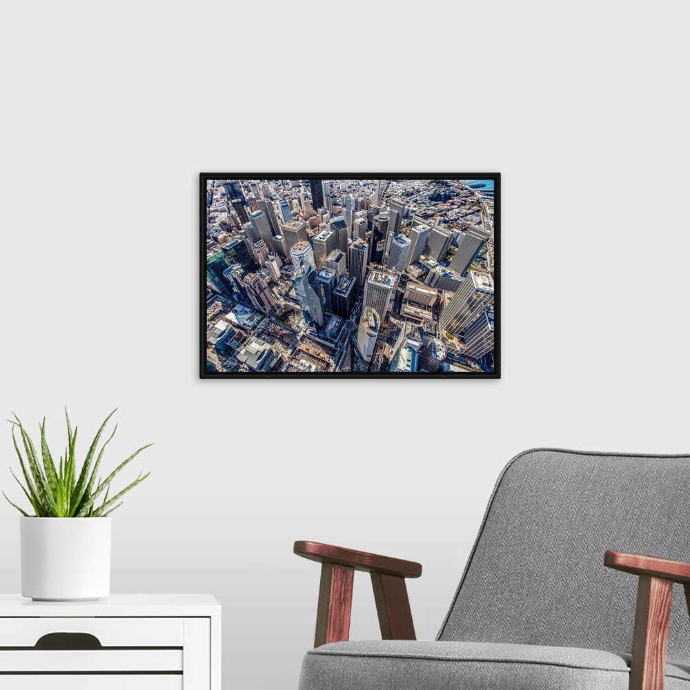 A modern room featuring Aerial photography of skyscrapers in downtown San Francisco, California.