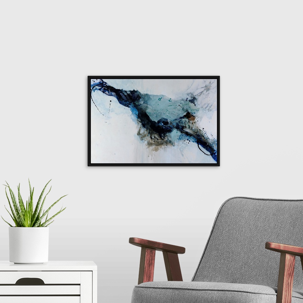 A modern room featuring Abstract painting in black and blue against a cool gray background.