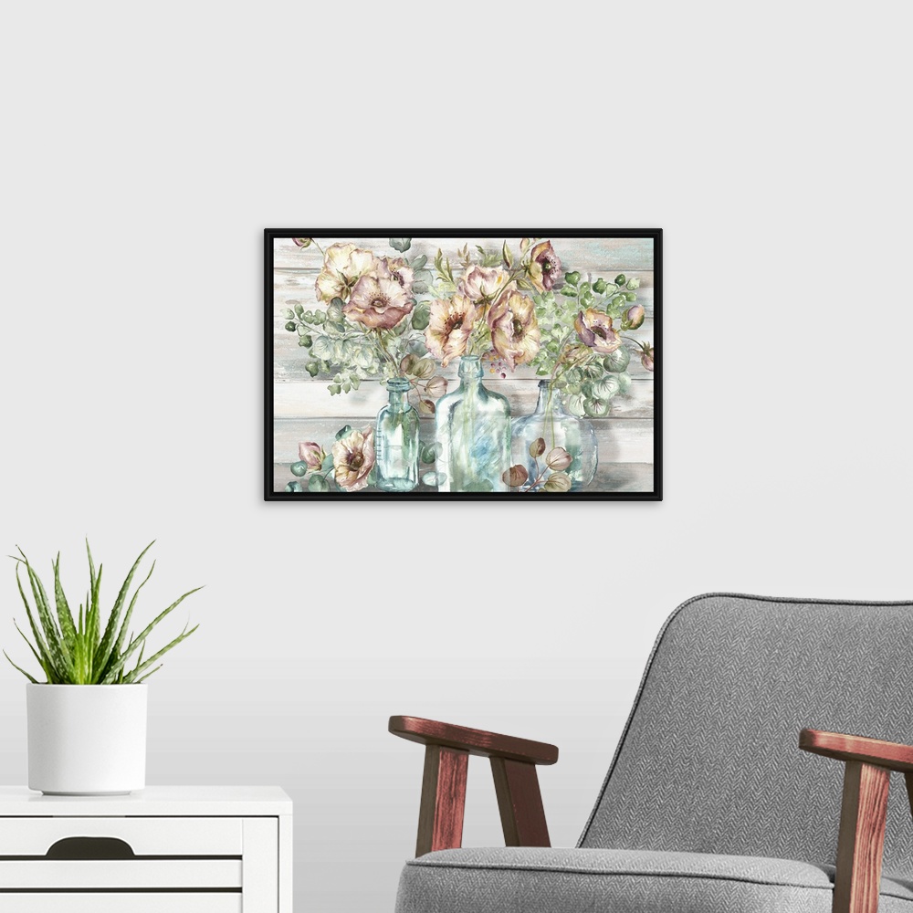 A modern room featuring A decorative watercolor painting of a glass mason jar full of poppy and eucalyptus in subdue tones.