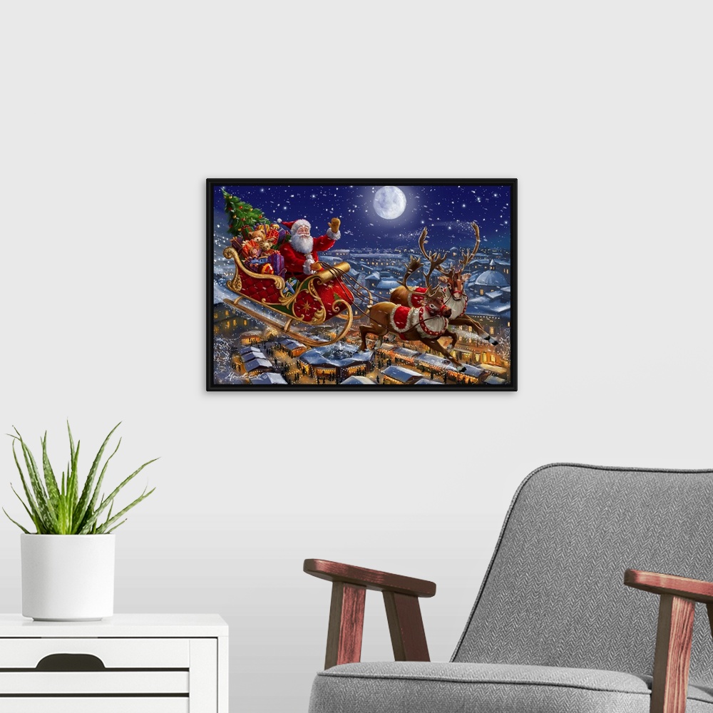 A modern room featuring A traditional image of Santa riding his sleigh of reindeer over a town lit up with lights.