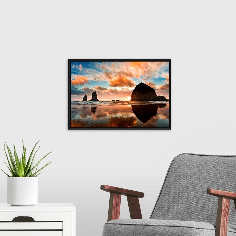 A modern room featuring Haystack Rock at sunset, Cannon Beach, Oregon.