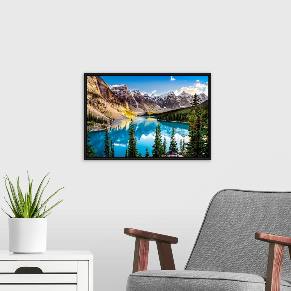 A modern room featuring Landscape sunset view of Morain lake and mountain range Alberta, Canada.