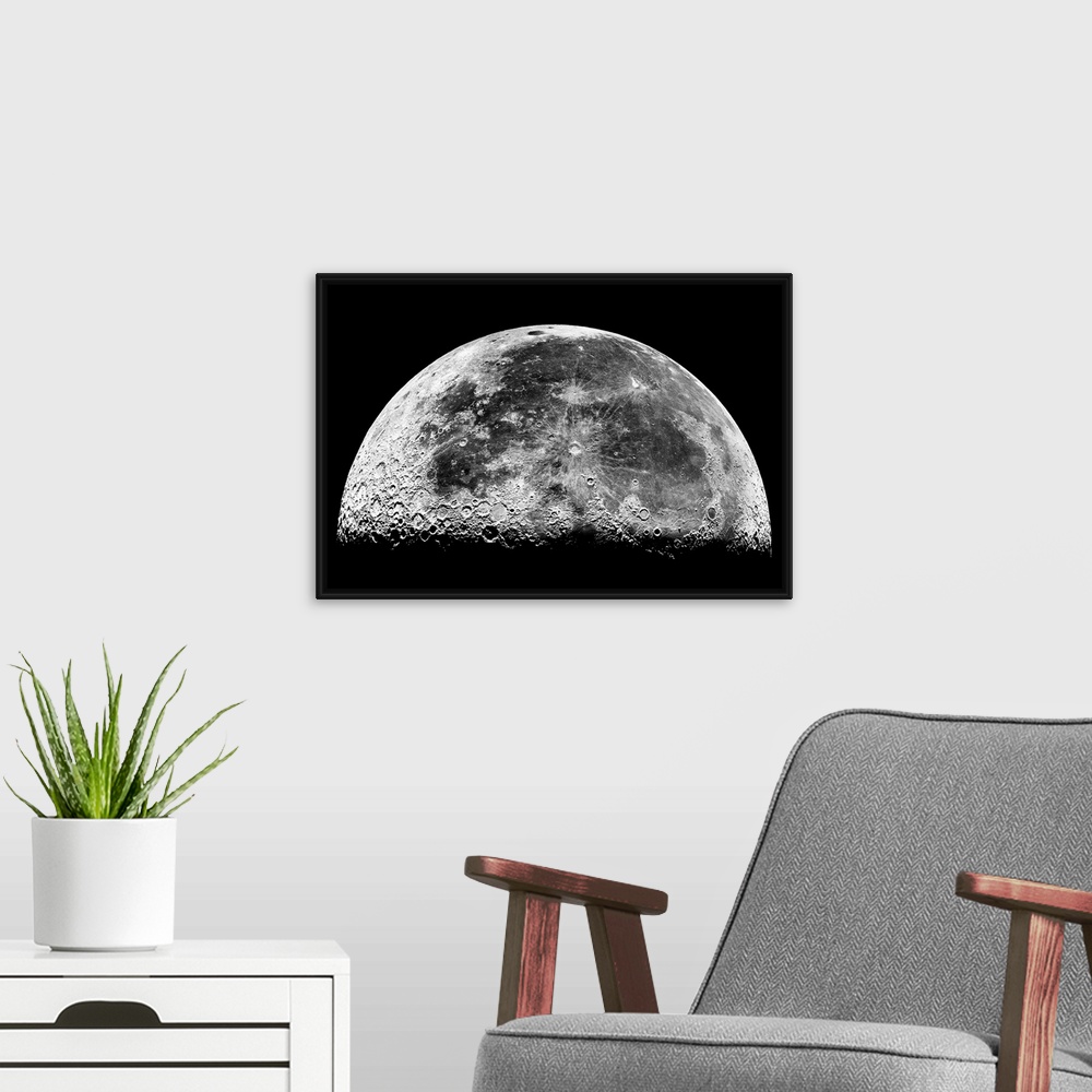A modern room featuring Horizontal photograph of the Earthos moon displaying geographic features and craters.