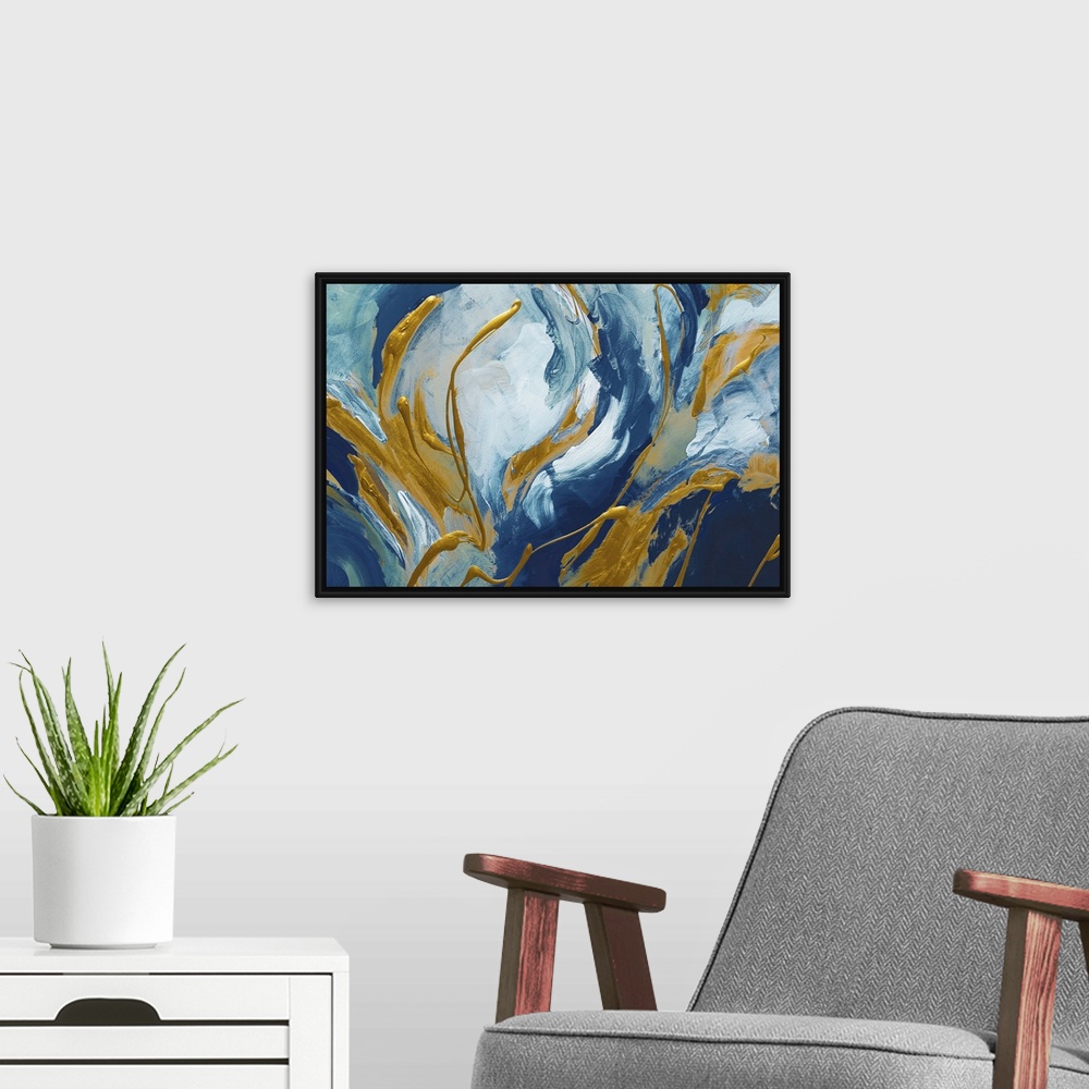 A modern room featuring Abstract artwork in blue and white with golden swirls.